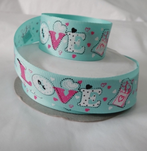 Лента репсовая (высота 2,7 см,в рулоне 23 метра) .